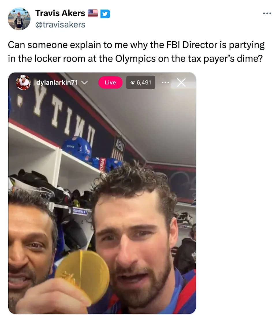 Tweet that reads, "Can someone explain to me why the FBI Director is partying in the locker room at the Olympics on the tax payer’s dime?" with a still from a video of him with one of the men's hockey players holding up his gold medal.