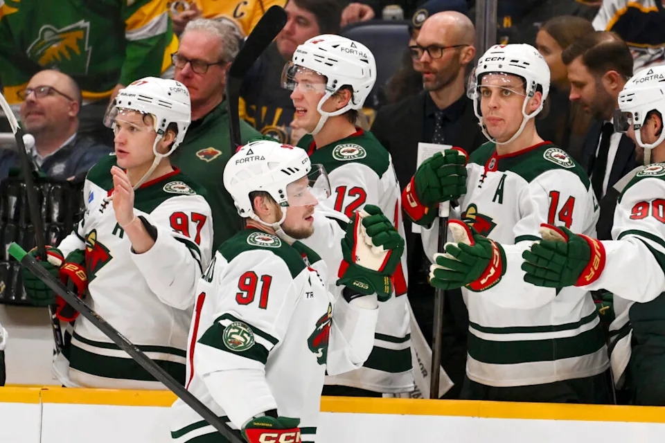 Feb 4, 2026; Nashville, Tennessee, USA; Minnesota Wild right wing Vladimir Tarasenko (91) celebrates with his teammates after scoring a goal against the Nashville Predators during the third period at Bridgestone Arena. Mandatory Credit: Steve Roberts-Imagn Images