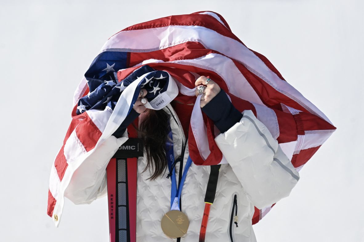 American skier Breezy Johnson wears a US flag on her head after <a href=