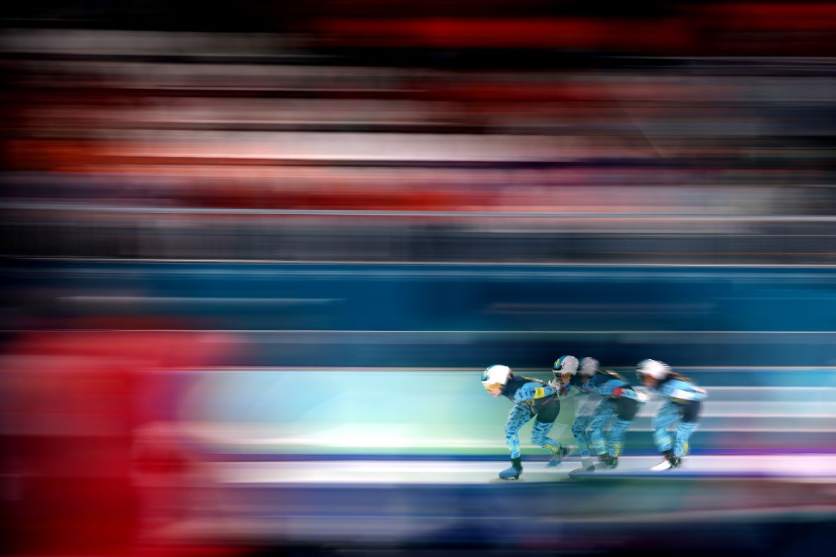 Kazakhstan's Nadezhda Morozova, Arina Ilyachshenko and Elizaveta Golubeva speed skate during the quarterfinals of the team pursuit event on February 14..