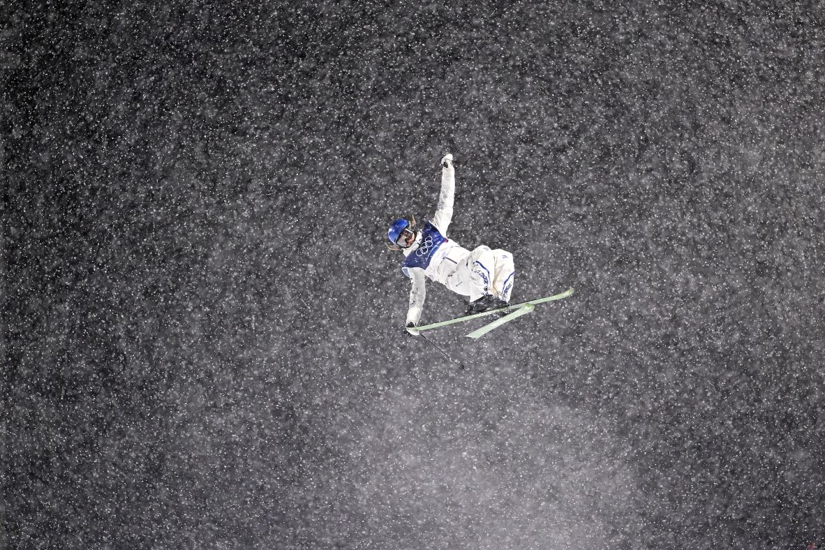 China's Eileen Gu warms up before competing in the women's freeski halfpipe on February 19.