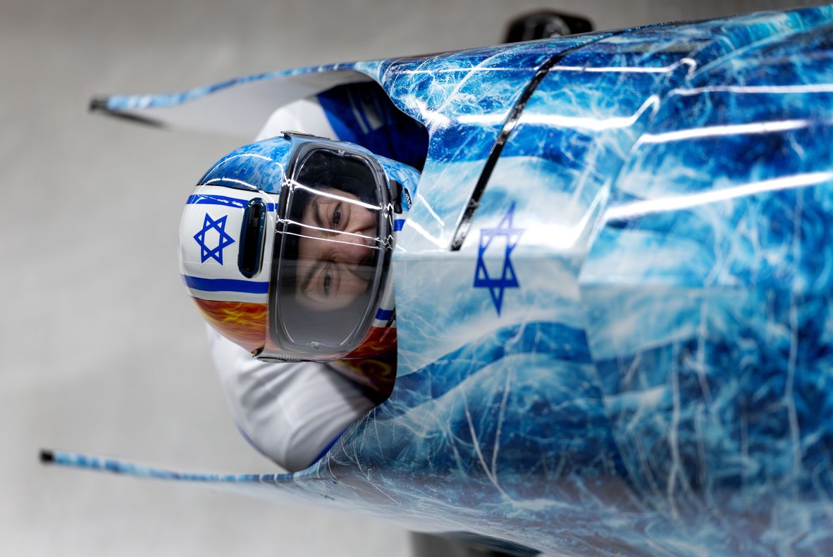 Israel's Adam Edelman pilots as he competes with teammate Menachem Chen in the two-man bobsled on February 16.