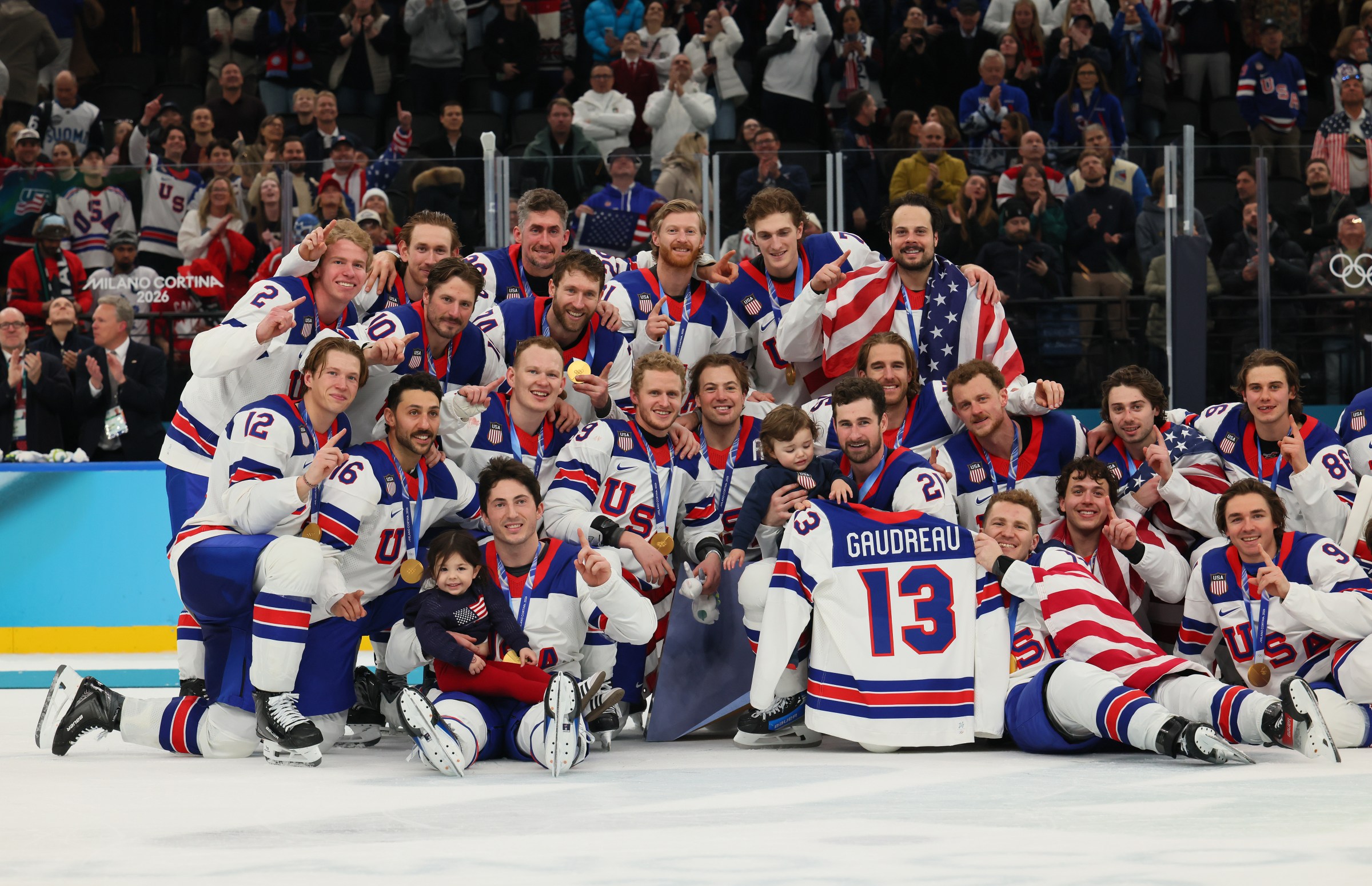MILAN, ITALY - FEBRUARY 22: Gold medalists, Team United States, pose for a team photo during the medal ceremony following the Men’s Gold Medal match between Canada and the United States on day 16 of the Milano Cortina 2026 Winter Olympic games at Milano Santagiulia Ice Hockey Arena on February 22, 2026 in Milan, Italy. (Photo by Bruce Bennett/Getty Images)