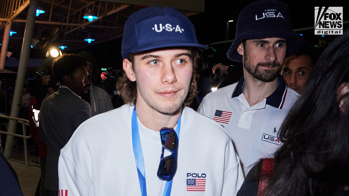Jack Hughes of the gold medal USA hockey team arrives to celebrate
