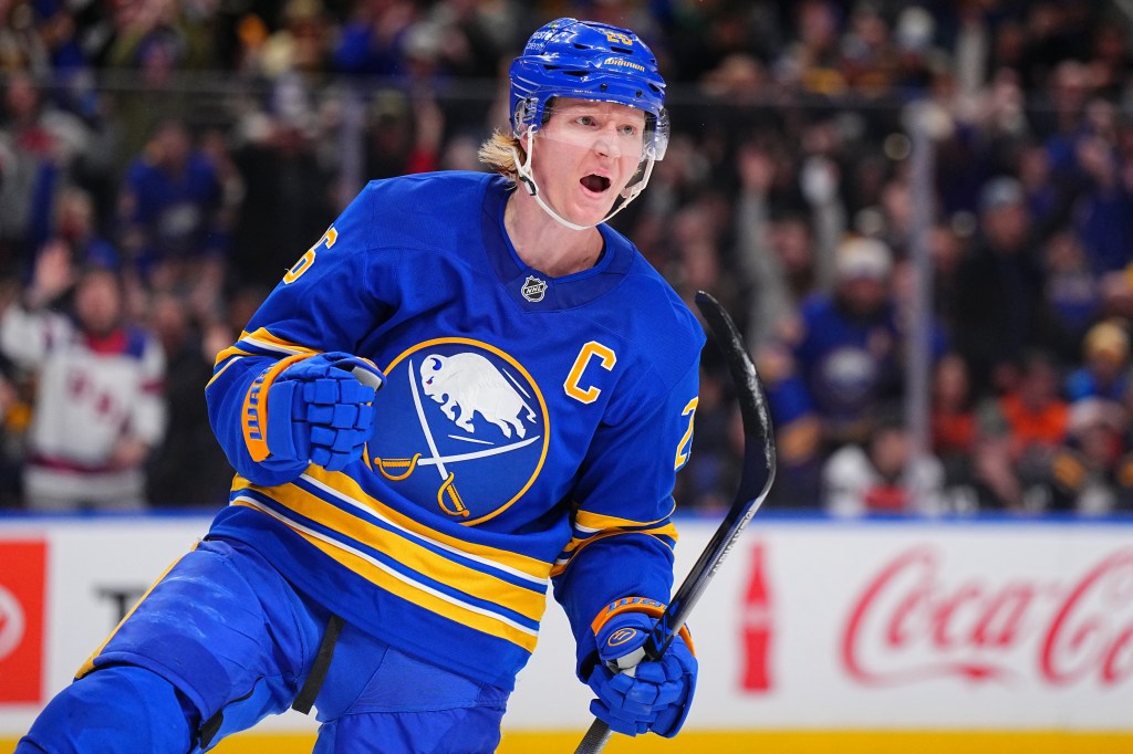 Buffalo Sabres player Rasmus Dahlin celebrates his goal.