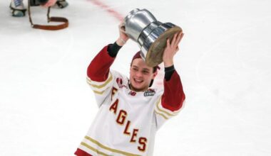 James Hagens #10 holding the Beanpot trophy after their 6-2 win over Boston University winning the Beanpot at TD Garden on February 9, 2026.