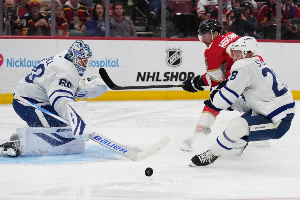 Panthers return from Olympics with win over Maple Leafs