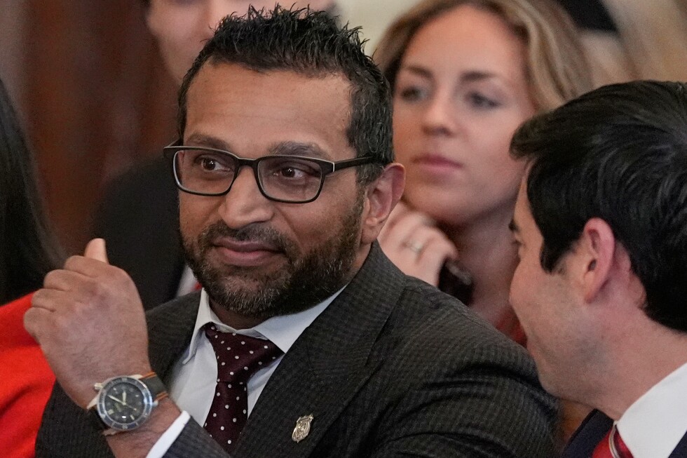 FBI director joins US hockey team in celebrating Olympic gold medal