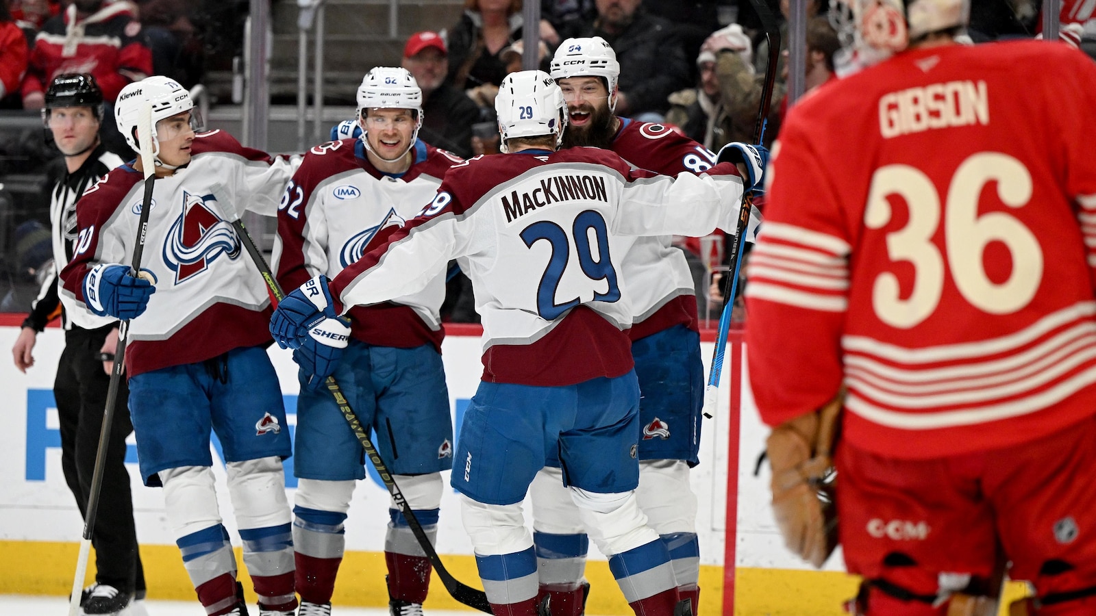 MacKinnon scores twice to become the 1st 40-goal scorer of the season, Avalanche blank Red Wings 5-0