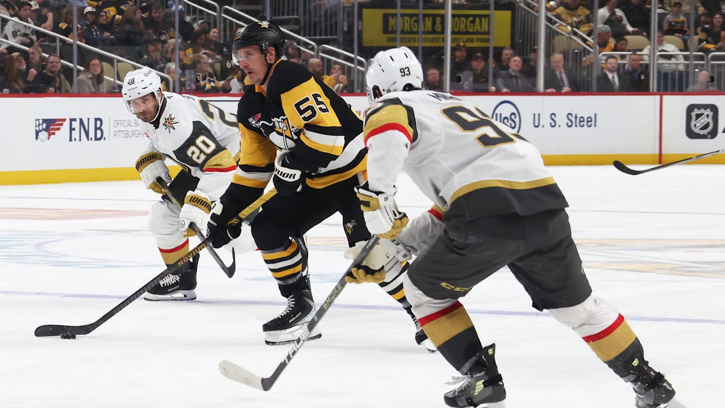 Mar 1, 2026; Pittsburgh, Pennsylvania, USA;  Pittsburgh Penguins center Noel Acciari (55) moves the puck between Vegas Golden Knights left wing Brandon Saad (20) and right wing Mitch Marner (93) during the third period at PPG Paints Arena. Mandatory Credit: Charles LeClaire-Imagn Images