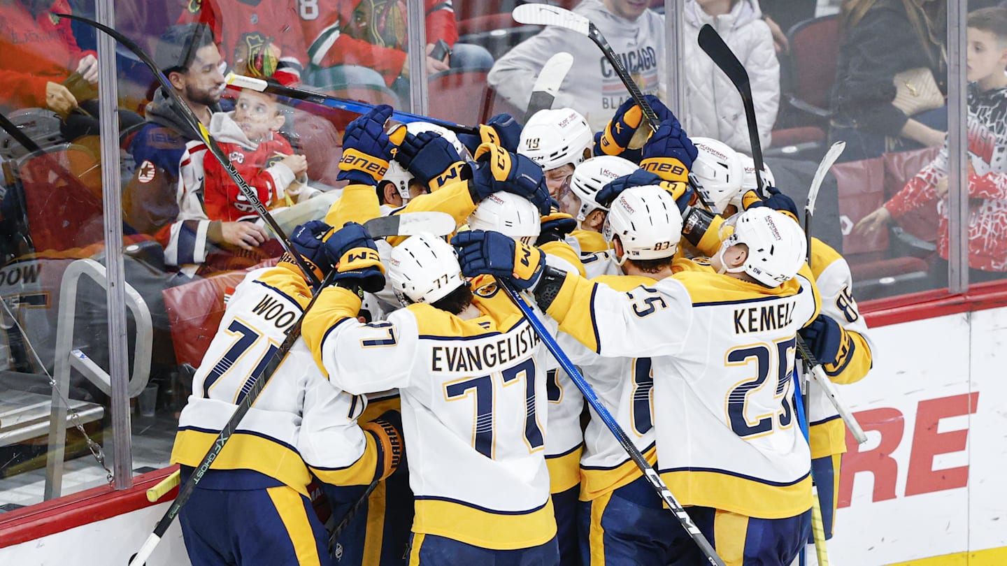 Mar 22, 2026; Chicago, Illinois, USA; Nashville Predators left wing Filip Forsberg (9) celebrates with teammates after scoring a game winning goal against the Chicago Blackhawks in overtime at United Center. Mandatory Credit: Kamil Krzaczynski-Imagn Images