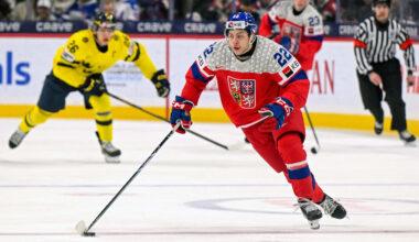 Jan 5, 2026; St. Paul, Minnesota, USA; Czechia forward Adam Titlbach (22) controls the puck against Sweden during the second period in the final of the 2026 IIHF World Junior Championship ice hockey tournament at Grand Casino Arena. Mandatory Credit: Nick Wosika-Imagn Images
