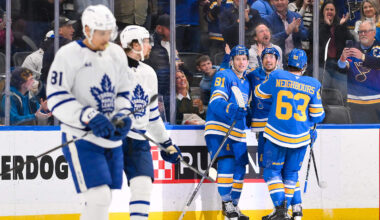 Mar 28, 2026; St. Louis, Missouri, USA; St. Louis Blues left wing Dylan Holloway (81) is congratulated by right wing Jordan Kyrou (25) and left wing Jake Neighbours (63) after scoring against the Toronto Maple Leafs during the third period at Enterprise Center. Mandatory Credit: Jeff Curry-Imagn Images