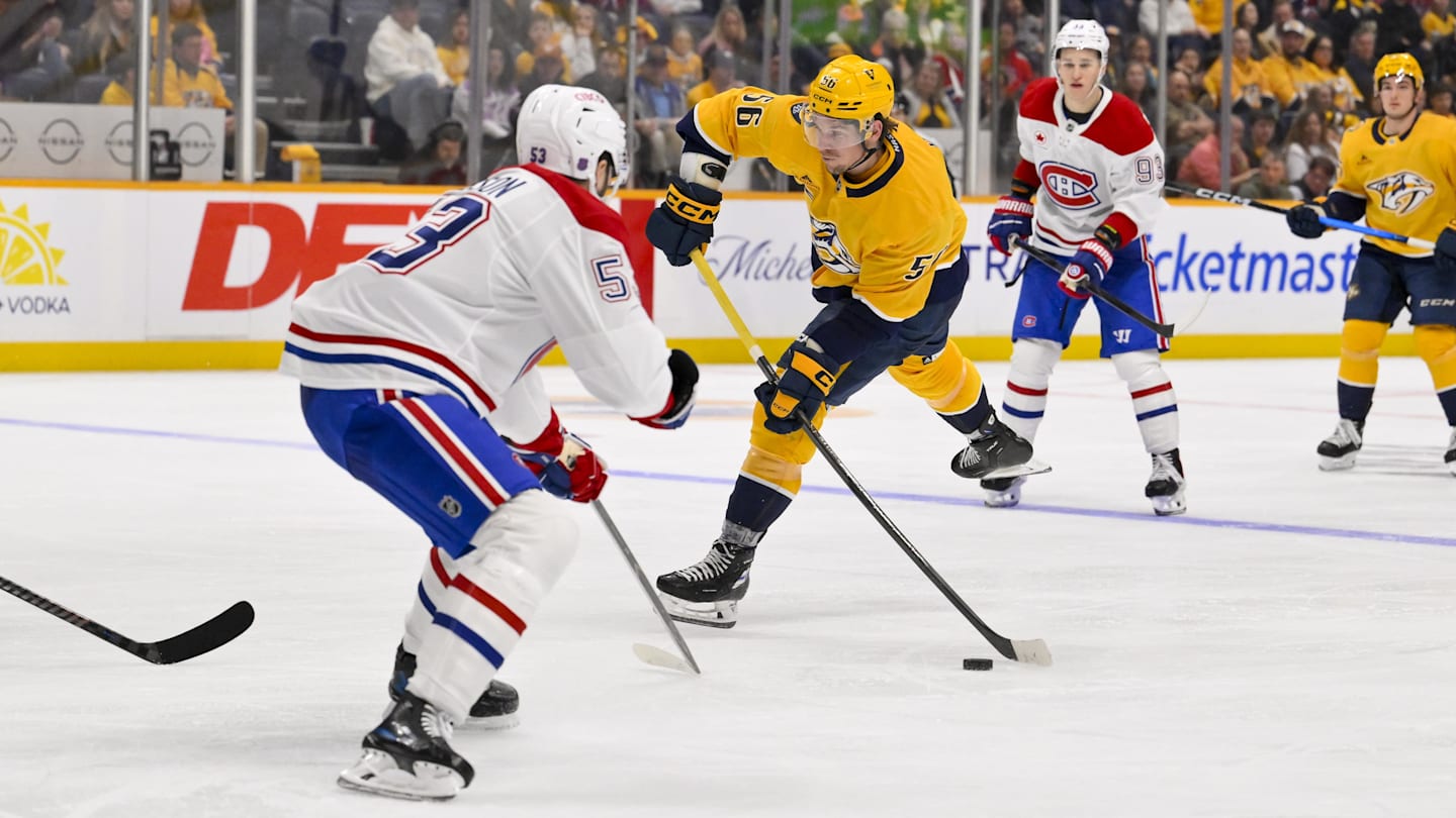 Mar 28, 2026; Nashville, Tennessee, USA;  Montreal Canadiens defenseman Noah Dobson (53) blocks the shot of Nashville Predators left wing Erik Haula (56) during the third period Gat Bridgestone Arena. Mandatory Credit: Steve Roberts-Imagn Images