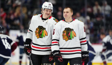 Mar 10, 2025; Denver, Colorado, USA; Chicago Blackhawks defenseman Ethan Del Mastro (38) and defenseman Artyom Levshunov (55) before the game against the Colorado Avalanche at Ball Arena. Mandatory Credit: Ron Chenoy-Imagn Images