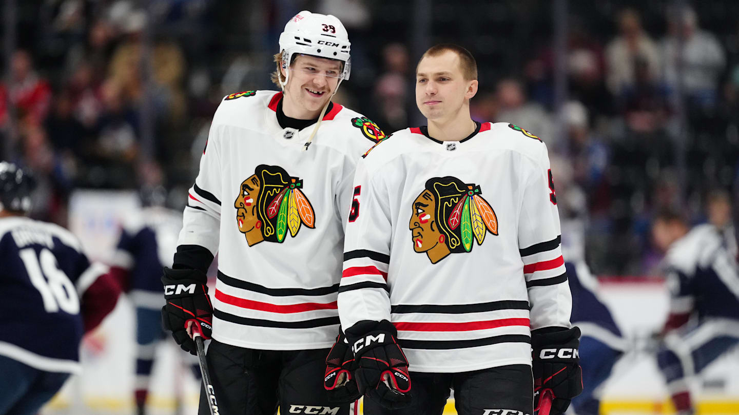 Mar 10, 2025; Denver, Colorado, USA; Chicago Blackhawks defenseman Ethan Del Mastro (38) and defenseman Artyom Levshunov (55) before the game against the Colorado Avalanche at Ball Arena. Mandatory Credit: Ron Chenoy-Imagn Images
