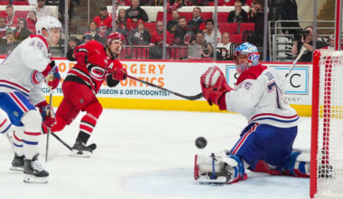 Mar 29, 2026; Raleigh, North Carolina, USA;  Carolina Hurricanes center Sebastian Aho (20) misses on his shot attempt against Montreal Canadiens goaltender Jakub Dobes (75) during the third period at Lenovo Center. Mandatory Credit: James Guillory-Imagn Images