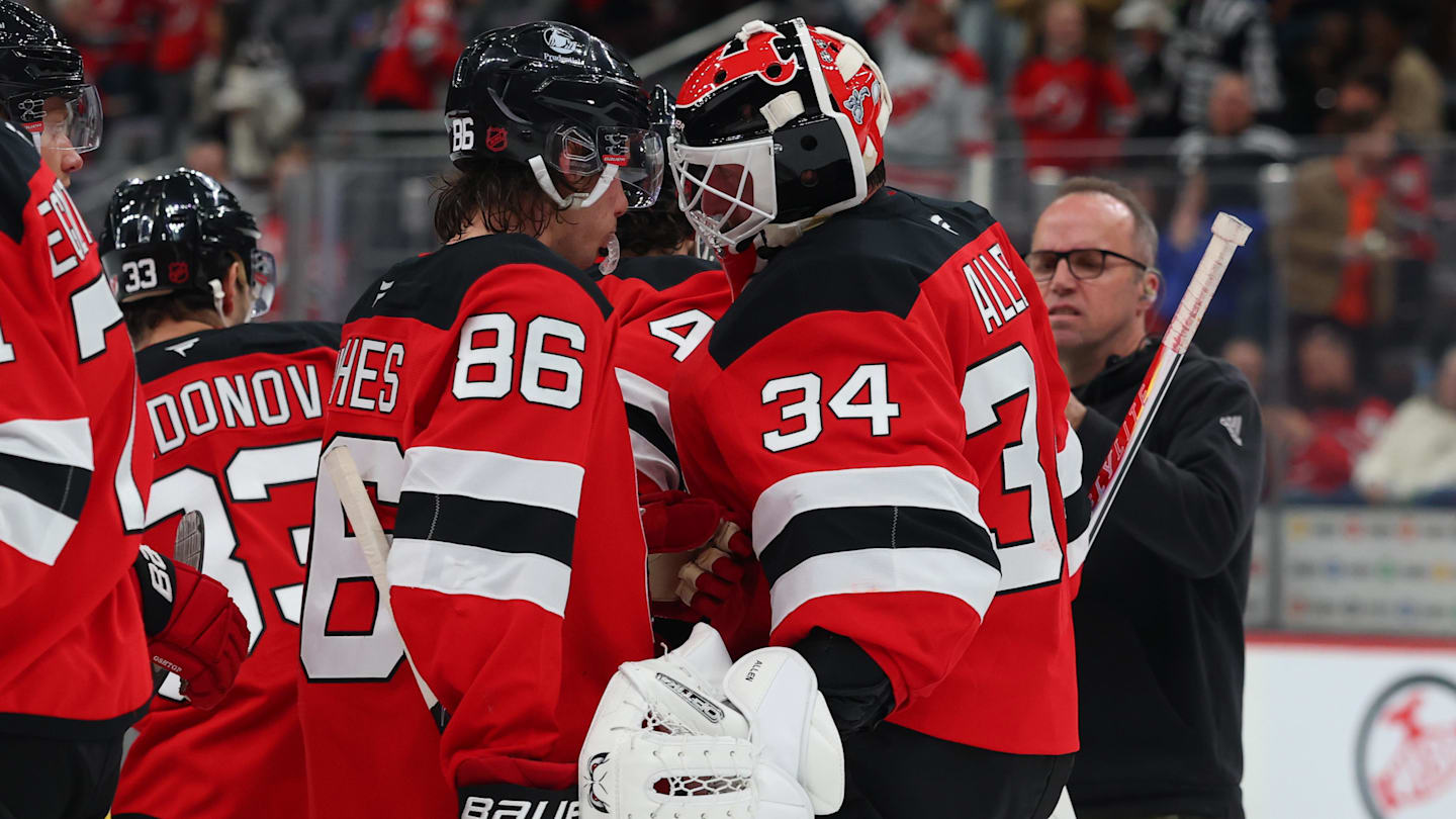 New Jersey Devils center Jack Hughes (86) and New Jersey Devils goaltender Jake Allen (34): Ed Mulholland-Imagn Images