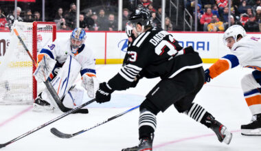 Feb 5, 2026; Newark, New Jersey, USA; New York Islanders goaltender Ilya Sorokin (30) defends against New Jersey Devils left wing Evgenii Dadonov (33) during the second period at Prudential Center. Mandatory Credit: John Jones-Imagn Images