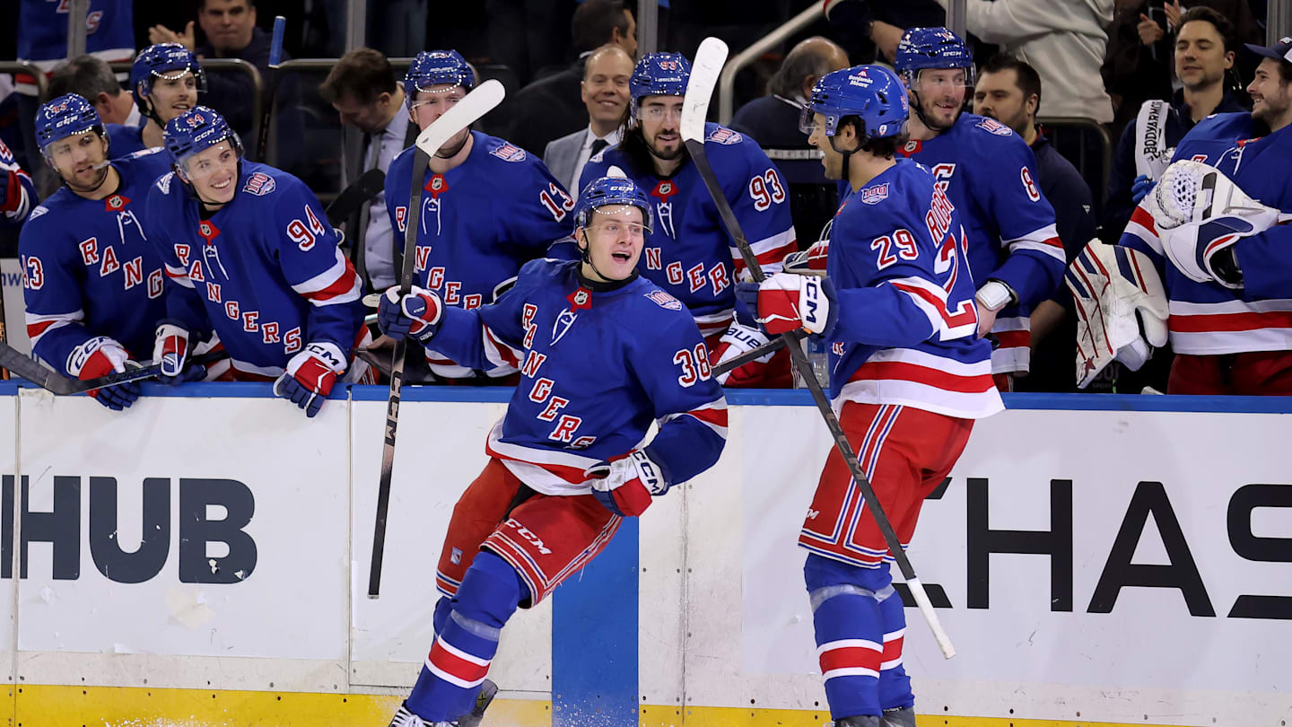Mar 27, 2026; New York, New York, USA; New York Rangers left wing Adam Sykora (38) celebrates his goal against the Chicago Blackhawks with defenseman Matthew Robertson (29) during the second period at Madison Square Garden. The goal was the first of his NHL career. Mandatory Credit: Brad Penner-Imagn Images