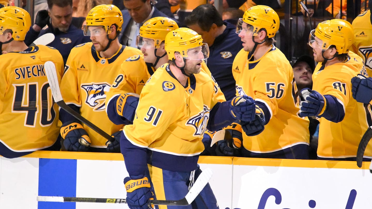 Mar 26, 2026; Nashville, Tennessee, USA;  Nashville Predators center Steven Stamkos (91) celebrates with his teammates after scoring a goal against the New Jersey Devils during the second period at Bridgestone Arena. Mandatory Credit: Steve Roberts-Imagn Images