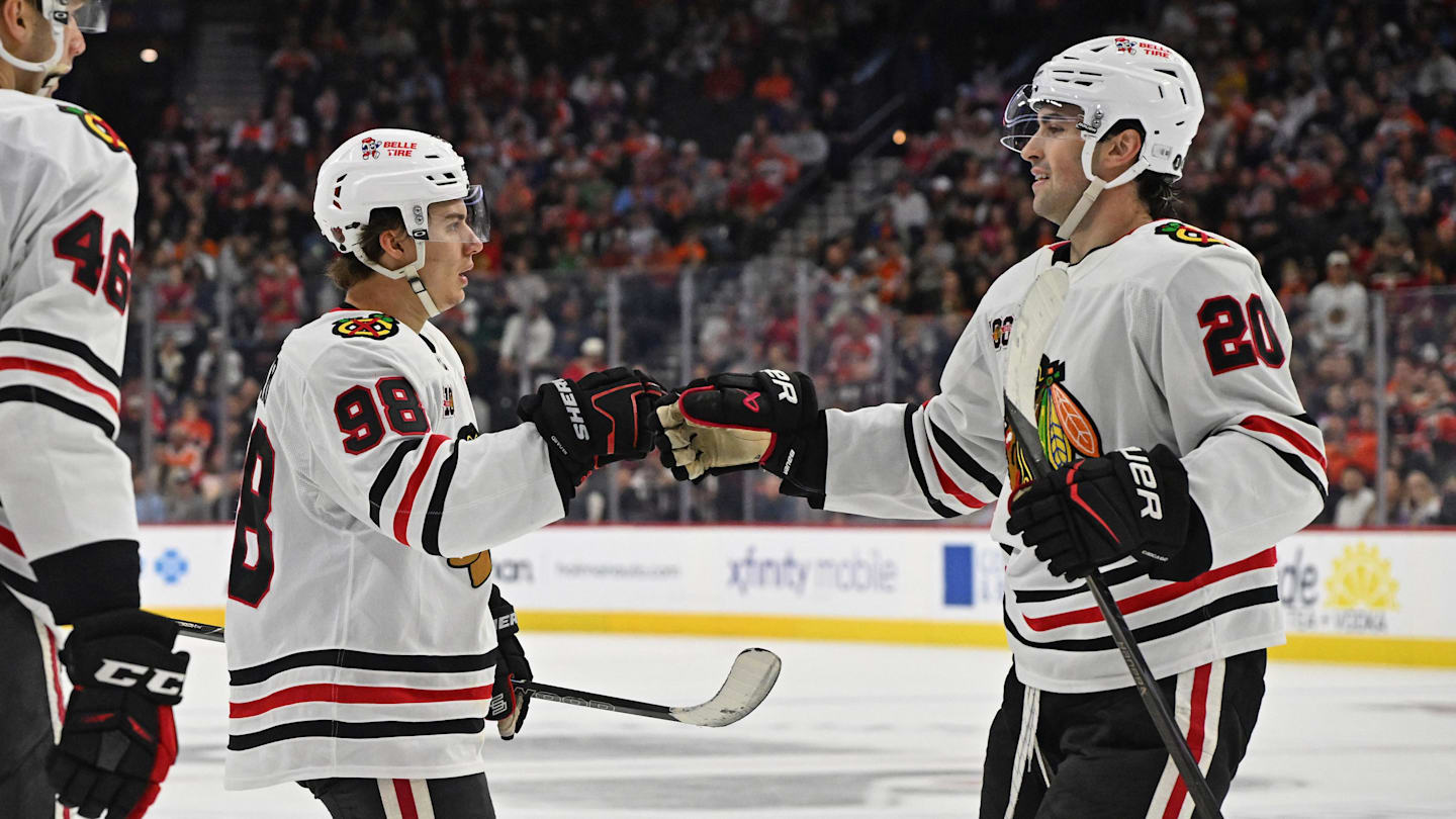 Mar 26, 2026; Philadelphia, Pennsylvania, USA; Chicago Blackhawks center Connor Bedard (98) celebrates his goal with center Ryan Greene (20) against the Philadelphia Flyers during the second period at Xfinity Mobile Arena. Mandatory Credit: Eric Hartline-Imagn Images