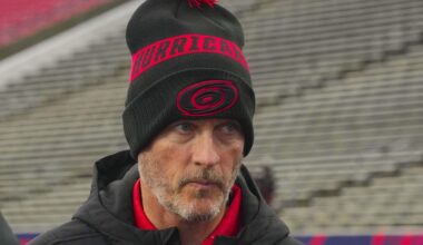 Feb 17, 2023; Raleigh, North Carolina, USA;  Carolina Hurricanes owner Tom Dundon looks on during practice at Carter-Finley Stadium. Mandatory Credit: James Guillory-Imagn Images