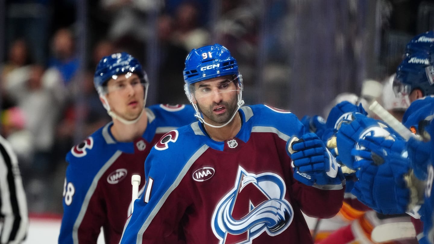 Mar 30, 2026; Denver, Colorado, USA; Colorado Avalanche center Nazem Kadri (91) celebrates his first goal of the first period against the Calgary Flames at Ball Arena. Mandatory Credit: Ron Chenoy-Imagn Images