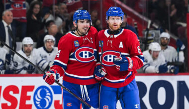 Sep 25, 2025; Montreal, Quebec, CAN; Montreal Canadiens defenseman Mike Matheson (8) celebrates his goal with center Nick Suzuki (14) against the Toronto Maple Leafs during the first period at Bell Centre. Mandatory Credit: David Kirouac-Imagn Images