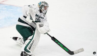 Michigan State goaltender Trey Augustine (1) hits the puck away against Michigan during the second period of Duel in the D at Little Caesars Arena in Detroit on Saturday, February 7, 2026.