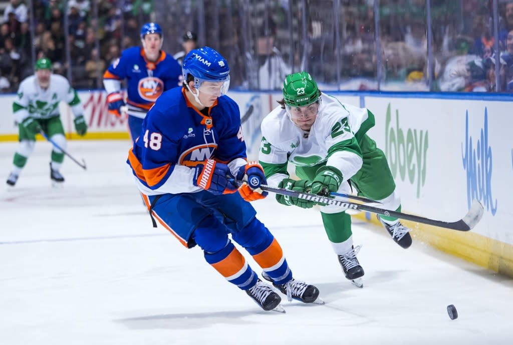 Matthew Schaeffer battles Matthew Knies for the puck during the Islanders’ 3-1 win over the Maple Leafs on March 17, 2026 in Toronto. NHLI via Getty Images