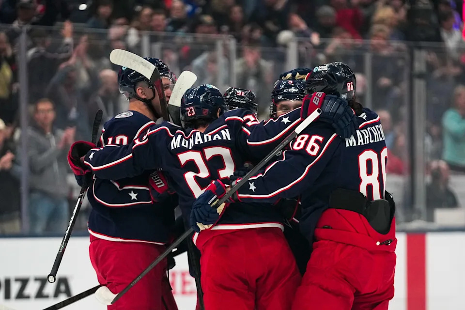 Columbus Blue Jackets defenseman Ivan Provorov (9) celebrates with teammates after scoring a goal in the first period at Nationwide Arena on Thursday, March 5, 2026 in Columbus, Ohio.