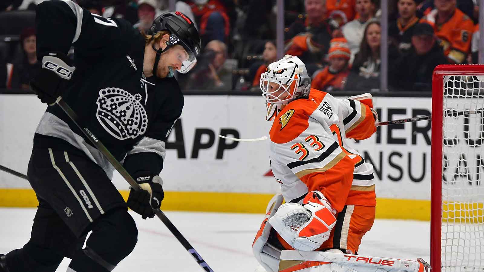 Los Angeles Kings left wing Warren Foegele (37) moves in for a shot against Anaheim Ducks goaltender Ville Husso (33) during the first period at Honda Center.