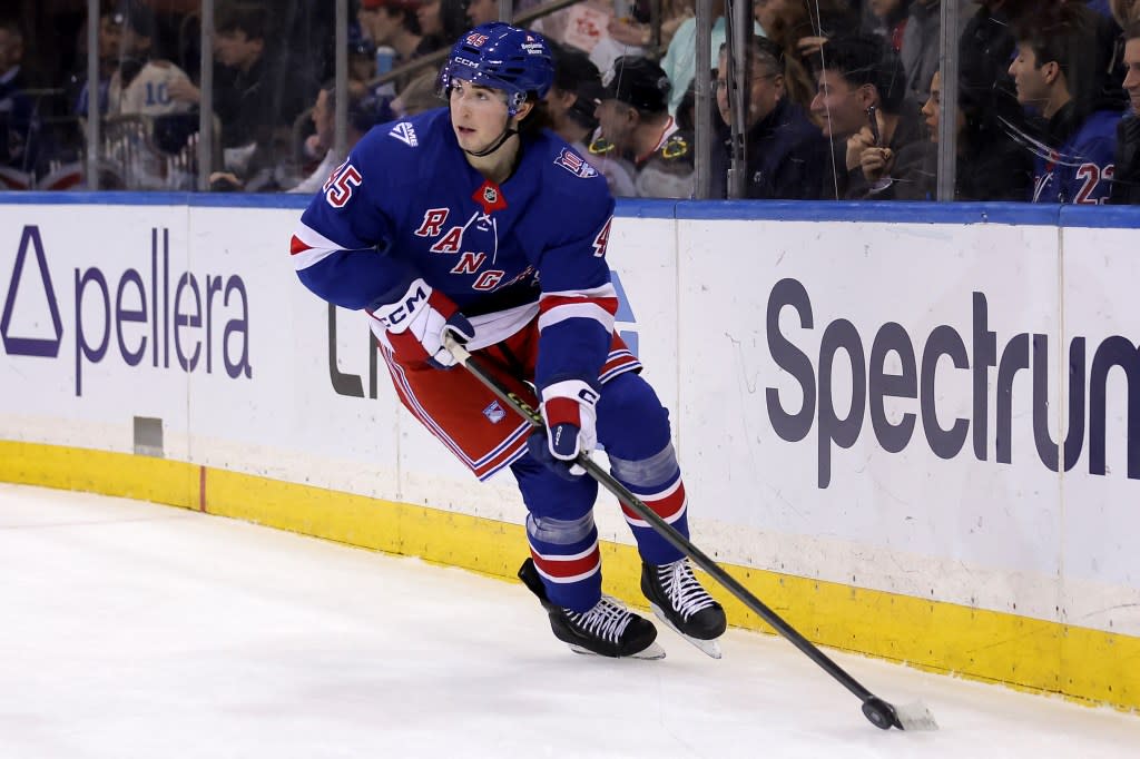 Drew Fortescue skates with the puck during the Rangers-Blackhawks game on March 26, 2026. IMAGN IMAGES via Reuters Connect