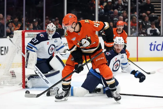 Feb 27, 2026; Anaheim, California, USA; Anaheim Ducks right wing Beckett Sennecke (45) controls the puck during the first period against the Winnipeg Jets at Honda Center.