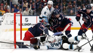 Mar 7, 2026; Columbus, Ohio, USA; Columbus Blue Jackets goalie Elvis Merzlikins (90) sticks Utah Mammoth center Barrett Hayton (27) out of the crease during the third period at Nationwide Arena. Mandatory Credit: Russell LaBounty-Imagn Images