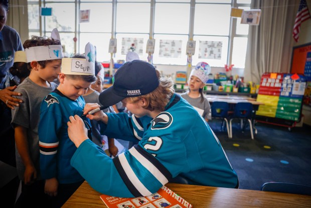 San Jose Sharks' Will Smith signs autographs at Bachrodt Elementary in San Jose, Calif., on Thursday, March 5, 2026. (Shae Hammond/Bay Area News Group)