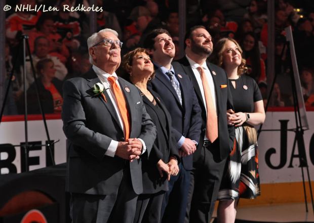 The Nolan family, from left, Lou, wife Ellen, son Jeff, son Matt and his wife, Adrienne at the 2022 celebration of Lou's 50th year behind the microphone. (Photo courtesy of the Nolan family)