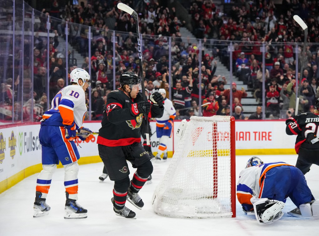 Warren Foegele celebrates after scoring the game-tying goal on Ilya Sorokin during the Islanders' 3-2 loss to the Senators on March 19, 2026 at Canadian Tire Centre in Ontario.
