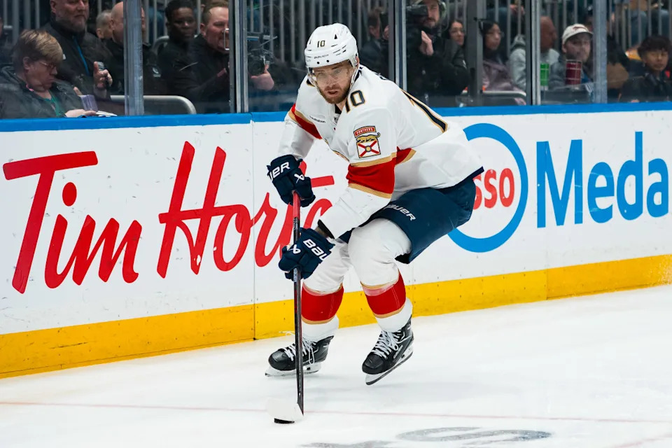 Florida Panthers forward A.J. Greer (10) handles the puck at Rogers Arena.Bob Frid-Imagn Images