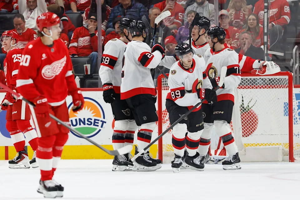 Mar 24, 2026; Detroit, Michigan, USA; Ottawa Senators center Lars Eller (89) receives congratulations from teammates after scoring in the second period against the Detroit Red Wings at Little Caesars Arena. Mandatory Credit: Rick Osentoski-Imagn Images