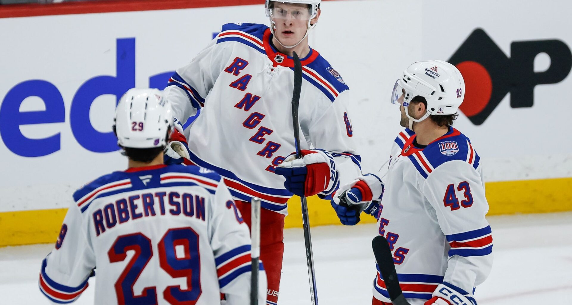 Garand stops 27 for first NHL win as Rangers down Blackhawks 6-1