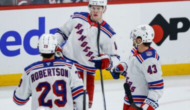 Garand stops 27 for first NHL win as Rangers down Blackhawks 6-1