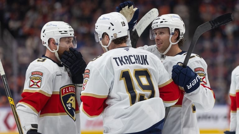 Florida Panthers' Sam Bennett (9), Matthew Tkachuk (19) and Cole...