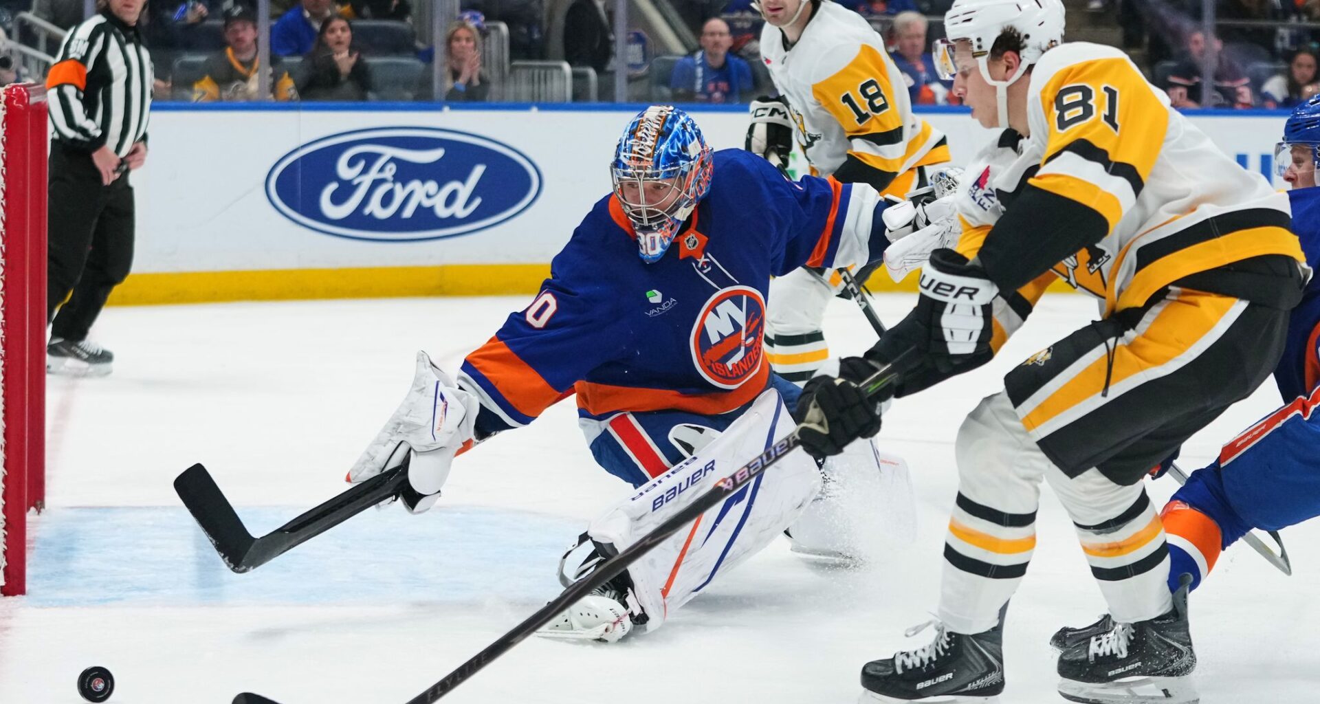 Penguins blitz the Islanders to win a big game in the East playoff race