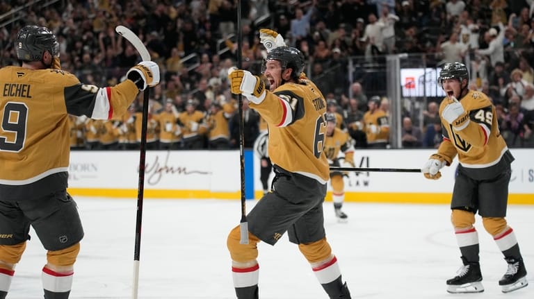 Vegas Golden Knights right wing Mark Stone (61) celebrates after...