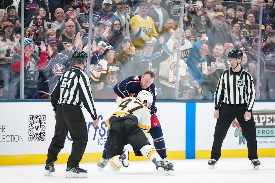Columbus Blue Jackets right wing Mathieu Olivier (24) fights Boston Bruins center Mark Kastelic (47) during the first period of the NHL hockey game at Nationwide Arena on March 29, 2026.