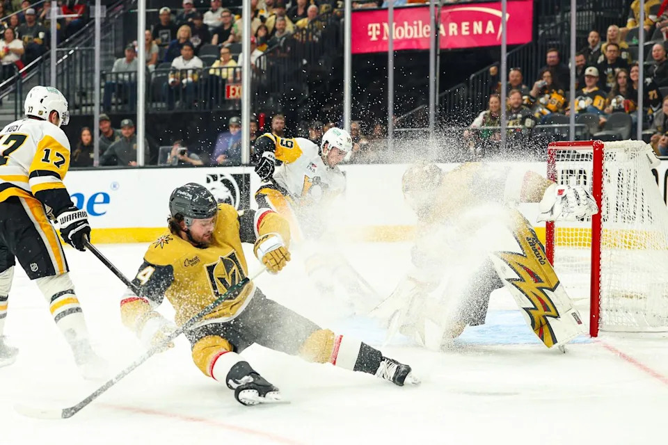 Vegas Golden Knights D Rasmus Andersson (4) slides while attempting to block a shot during an NHL game against the Pittsburgh Penguins on Thursday, March 12, 2026, in Las Vegas, Nevada. 