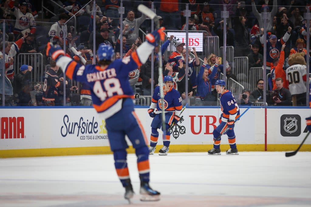 Islanders player Brayden Schenn (10) celebrates his goal with teammates Matthew Schaefer (48) and Calum Ritchie (64). Heather Khalifa for the NY Post