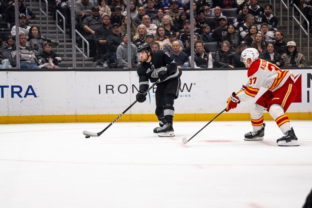Los Angeles Kings right wing Alex Lafferriere (14) passing the puck to a teammate during an NHL hockey game against the Calgary Flames on February 26th, 2026 in Los Angeles, CA.